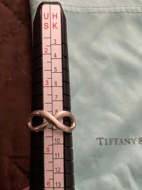 Tiffany & Co. Sterling silver infinity ring with Blue Pouch size 4